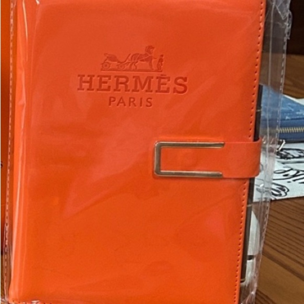 Hermès Orange Leather Notebook Cover and pen